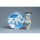 A Chinese famille verte 'yenyen' 'rice production' vase and a large blue and white 'peacock' dish, 1