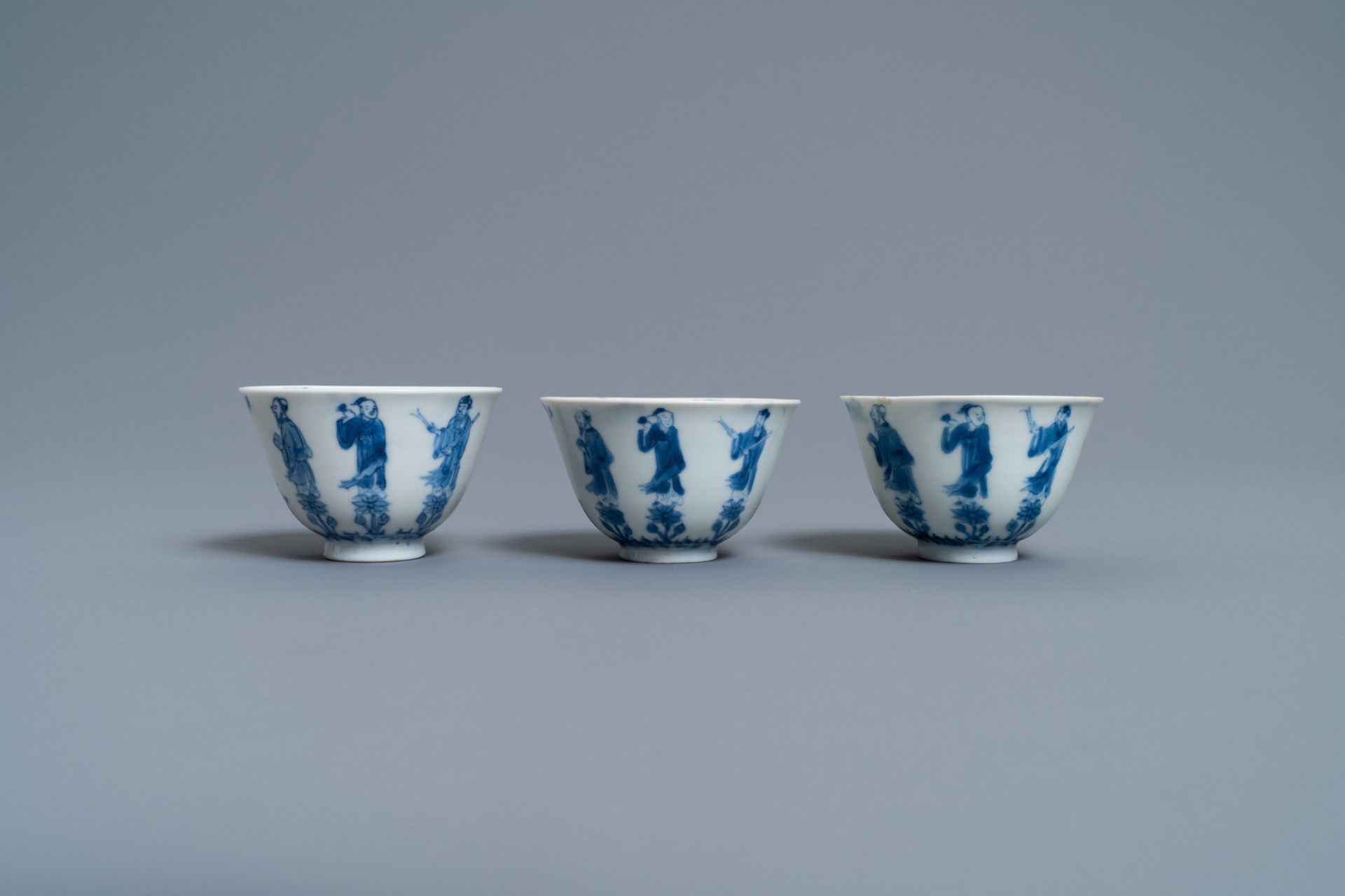Three Chinese blue and white cups and two saucers, Kangxi - Image 4 of 9