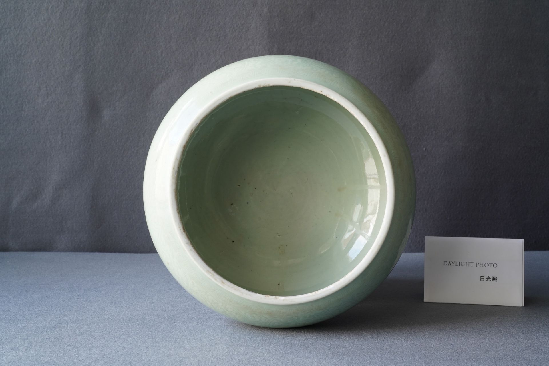 A Chinese celadon-glazed tripod censer with incised underglaze design, Kangxi - Image 9 of 26