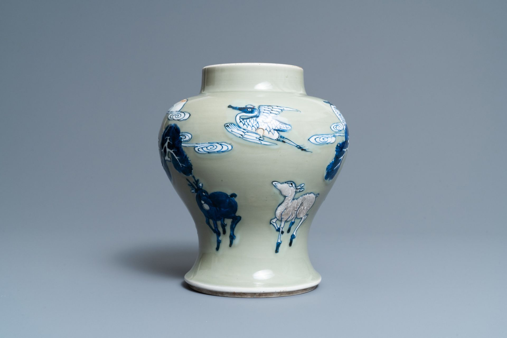 A Chinese blue, white and copper-red celadon-ground 'birds and deer' vase, Kangxi - Image 2 of 7