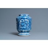 A Chinese blue and white 'birds and butterflies' vase, seal mark, 19th C.