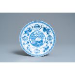 A Chinese blue and white plate with a boy surrounded by antiquities, ex-coll. August the Strong, Kan