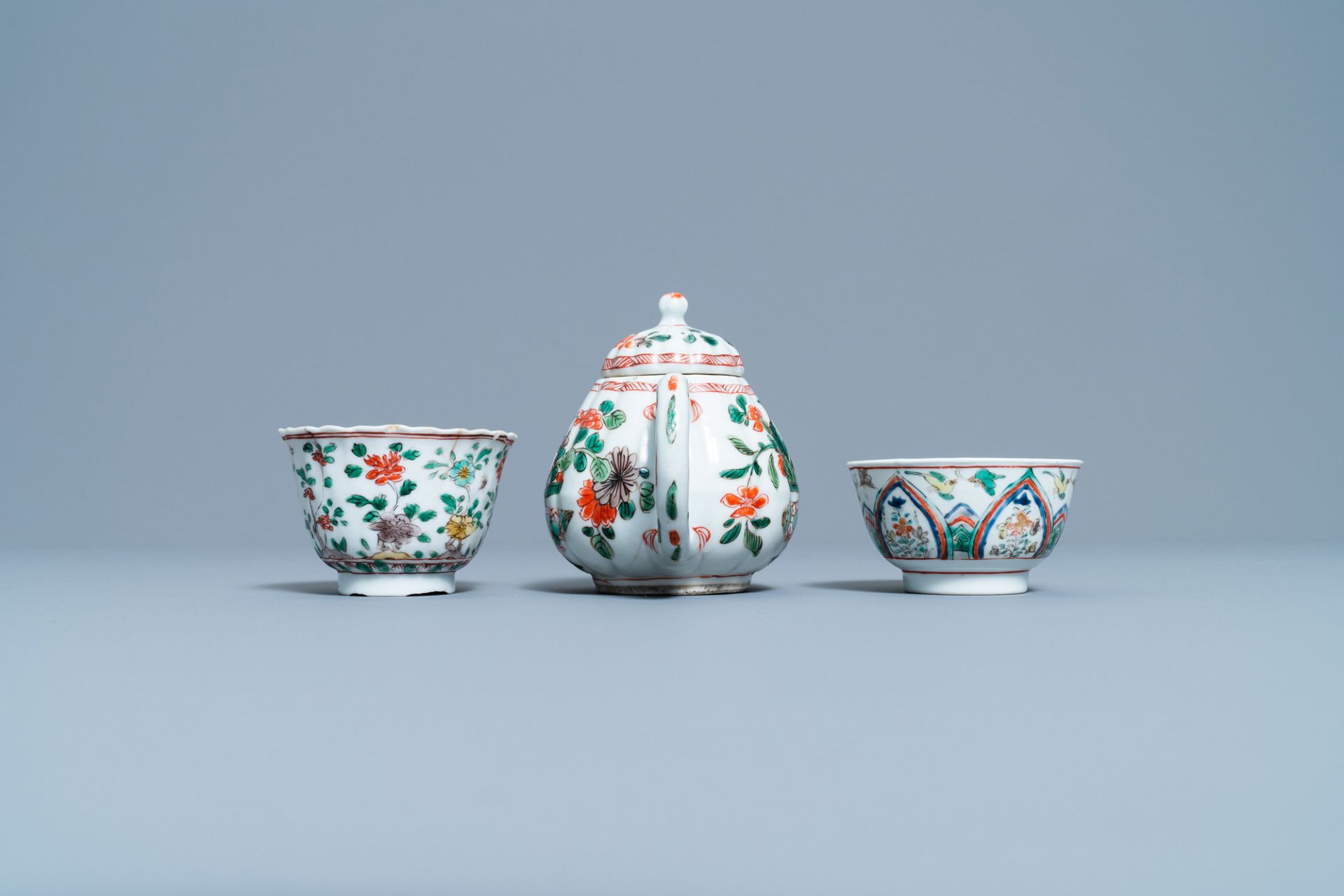 A Chinese famille verte teapot, two cups and three saucers, Kangxi - Image 8 of 10