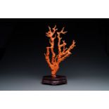 A large Chinese carved red coral group with birds on floral branches, 19/20th C.