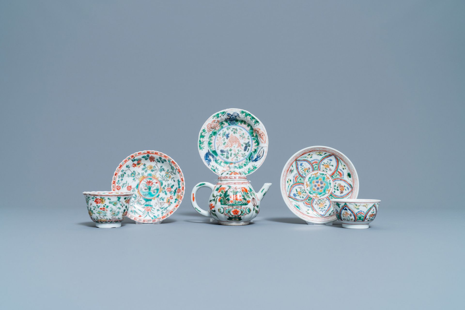 A Chinese famille verte teapot, two cups and three saucers, Kangxi - Image 2 of 10