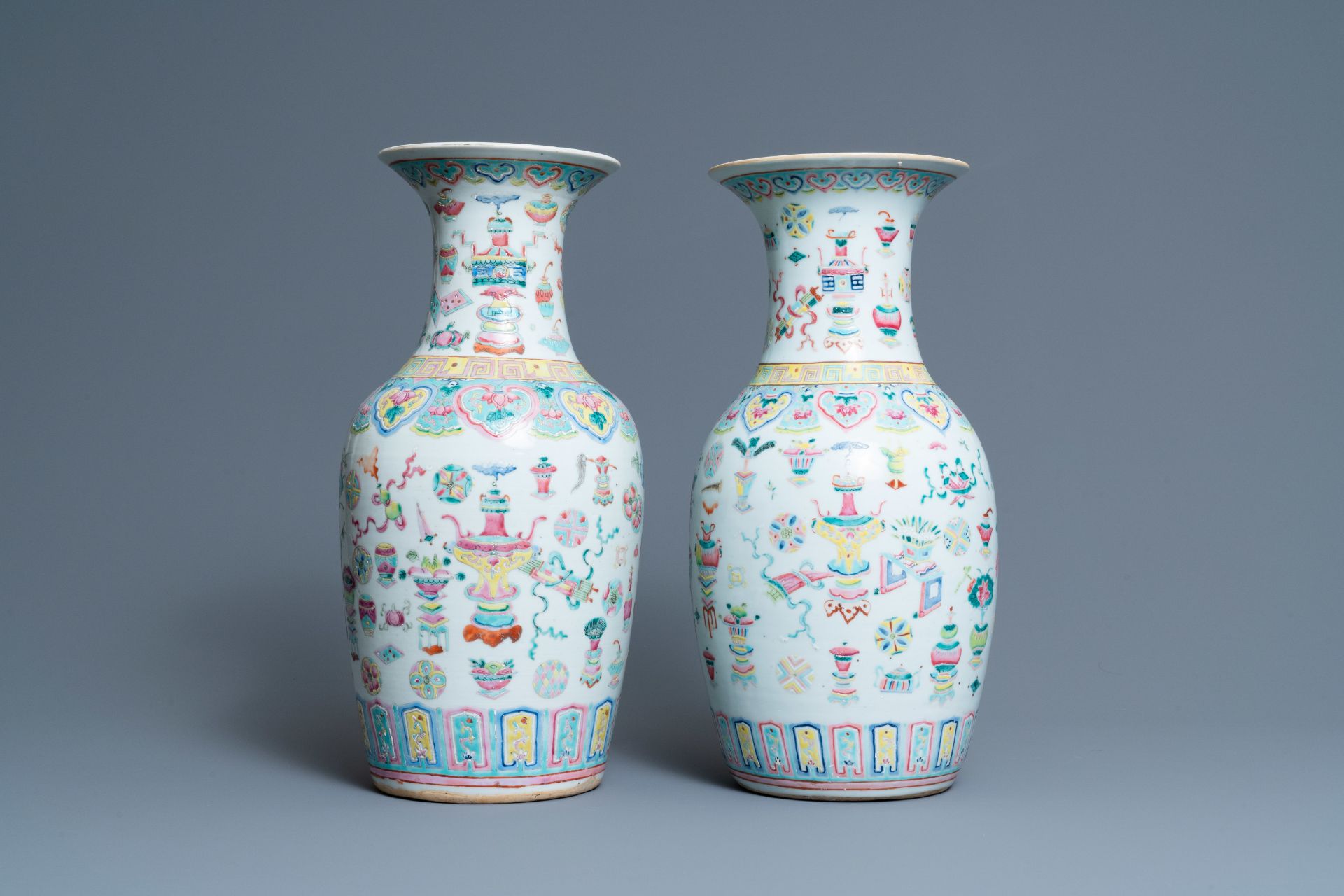 A pair of Chinese famille rose 'antiquities' vases, 19th C.