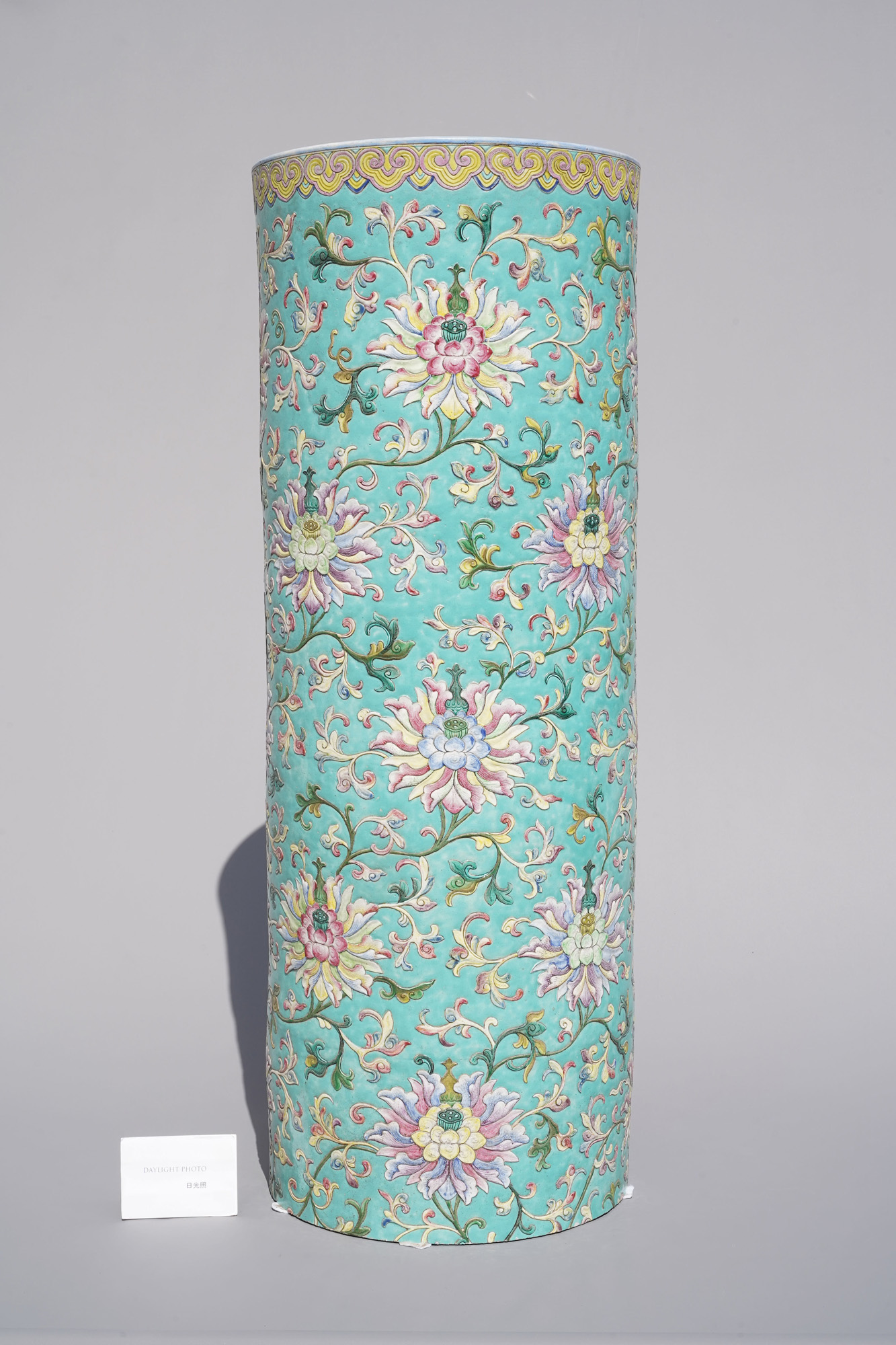 A large Chinese famille rose cylindrical vase with applied lotus scrolls, Jiaqing/Daoguang - Image 11 of 49