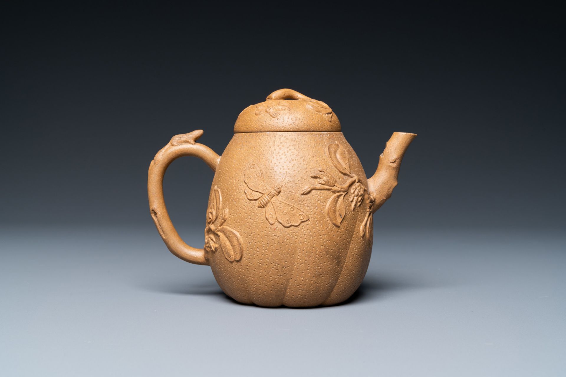 A Chinese Yixing stoneware teapot with squirrels and butterflies, seal mark, 18th C. - Image 5 of 8