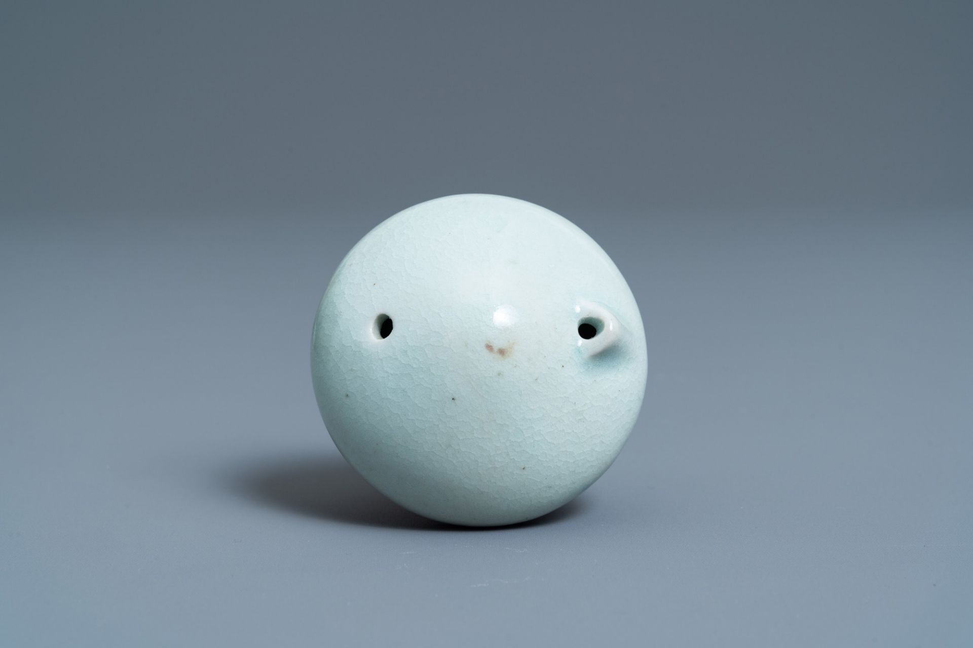 A Korean celadon-glazed water dropper, Joseon, 19th C. - Image 6 of 7