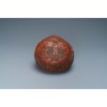 A Chinese red cinnabar lacquer peach-shaped box and cover, Kangxi