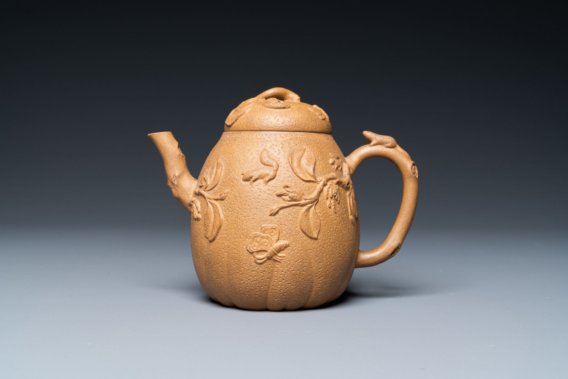 A Chinese Yixing stoneware teapot with squirrels and butterflies, seal mark, 18th C. - Image 3 of 8