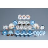 Twenty-four Chinese cups and twenty-five saucers in blue and white, famille rose, verte and Imari-st