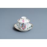 A Chinese famille rose 'Wu Shuang Pu' covered cup and saucer, Daoguang mark and of the period