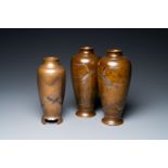 Three Japanese silver- and brass inlaid bronze vases, Meiji, 19th C.