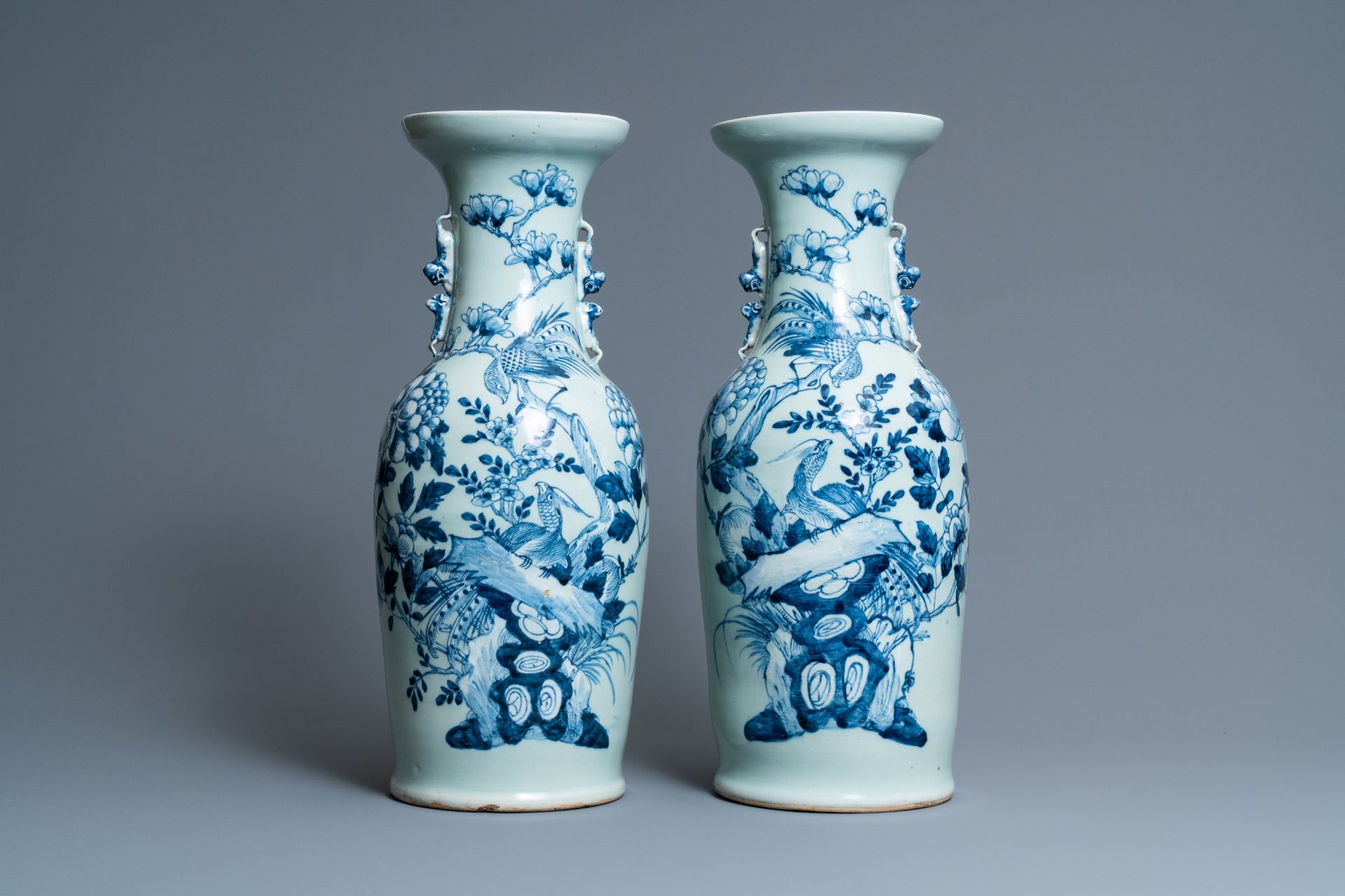 A pair of Chinese blue and white celadon 'pheasant' vases, 19th C.