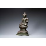 A large Burmese bronze figure of Buddha, 17/18th C.