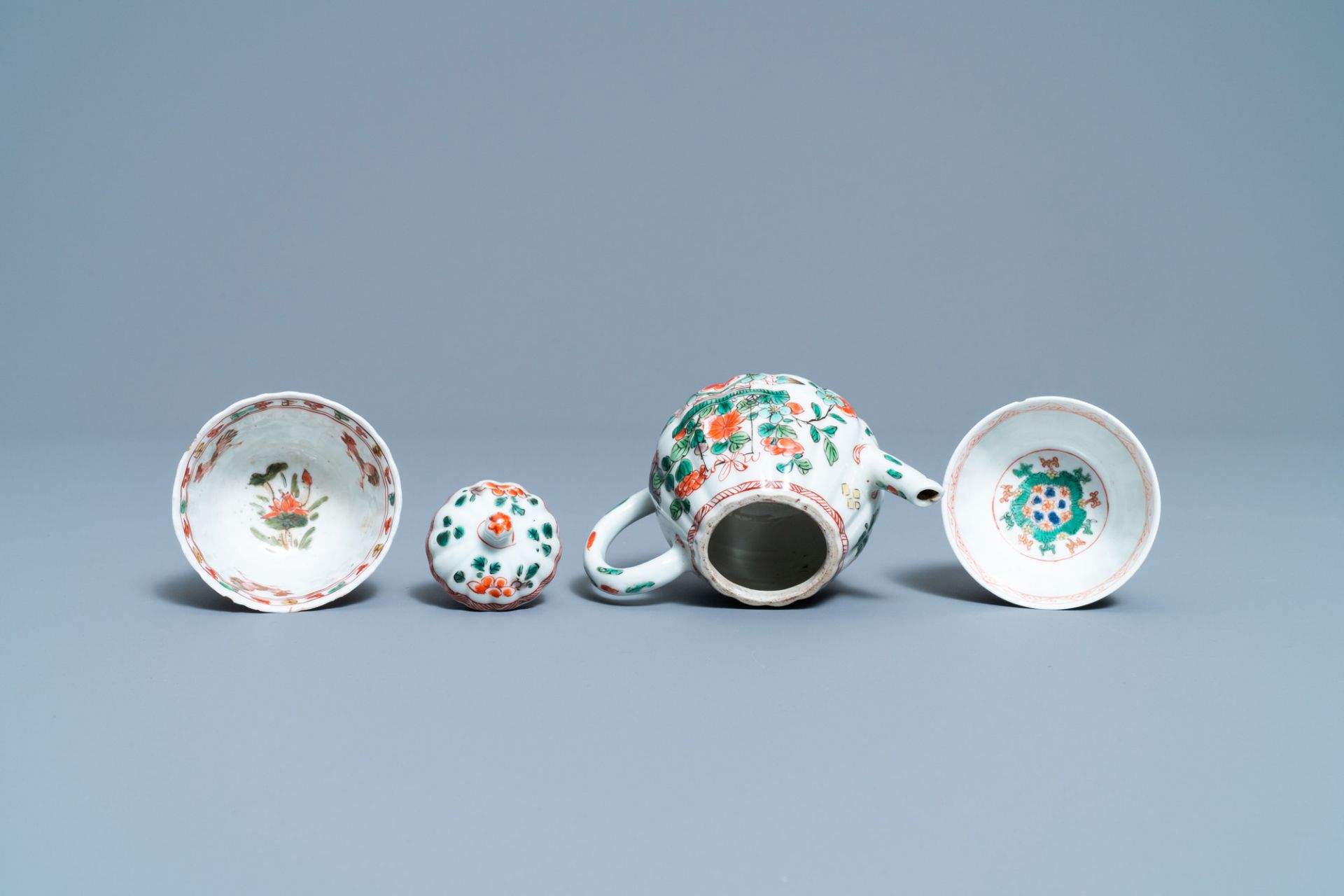 A Chinese famille verte teapot, two cups and three saucers, Kangxi - Image 9 of 10