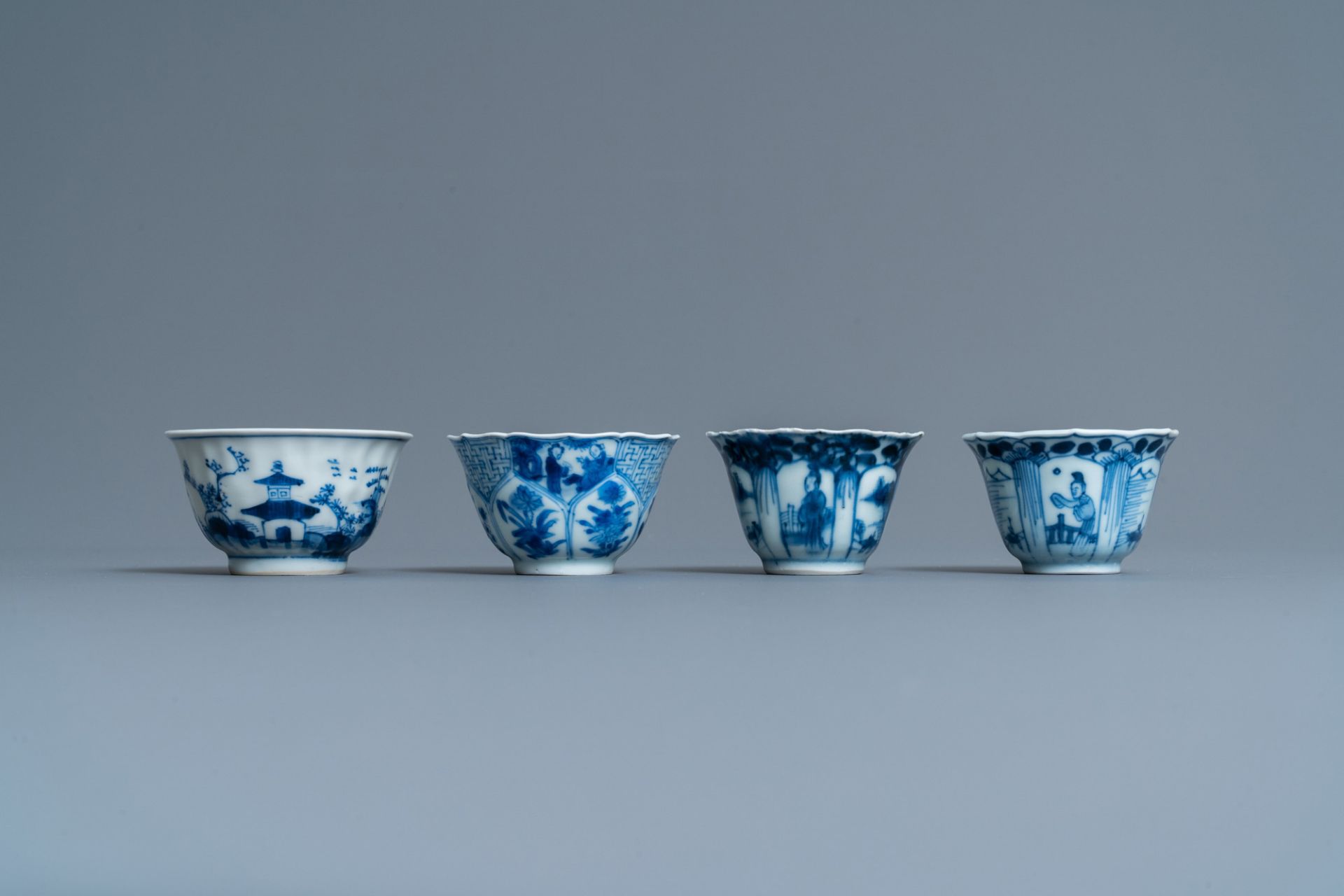 Twenty-one Chinese blue and white saucers and eighteen cups, Kangxi - Image 8 of 17