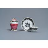 A Chinese famille rose tea caddy and a grisaille cup and saucer, Yongzheng/Qianlong