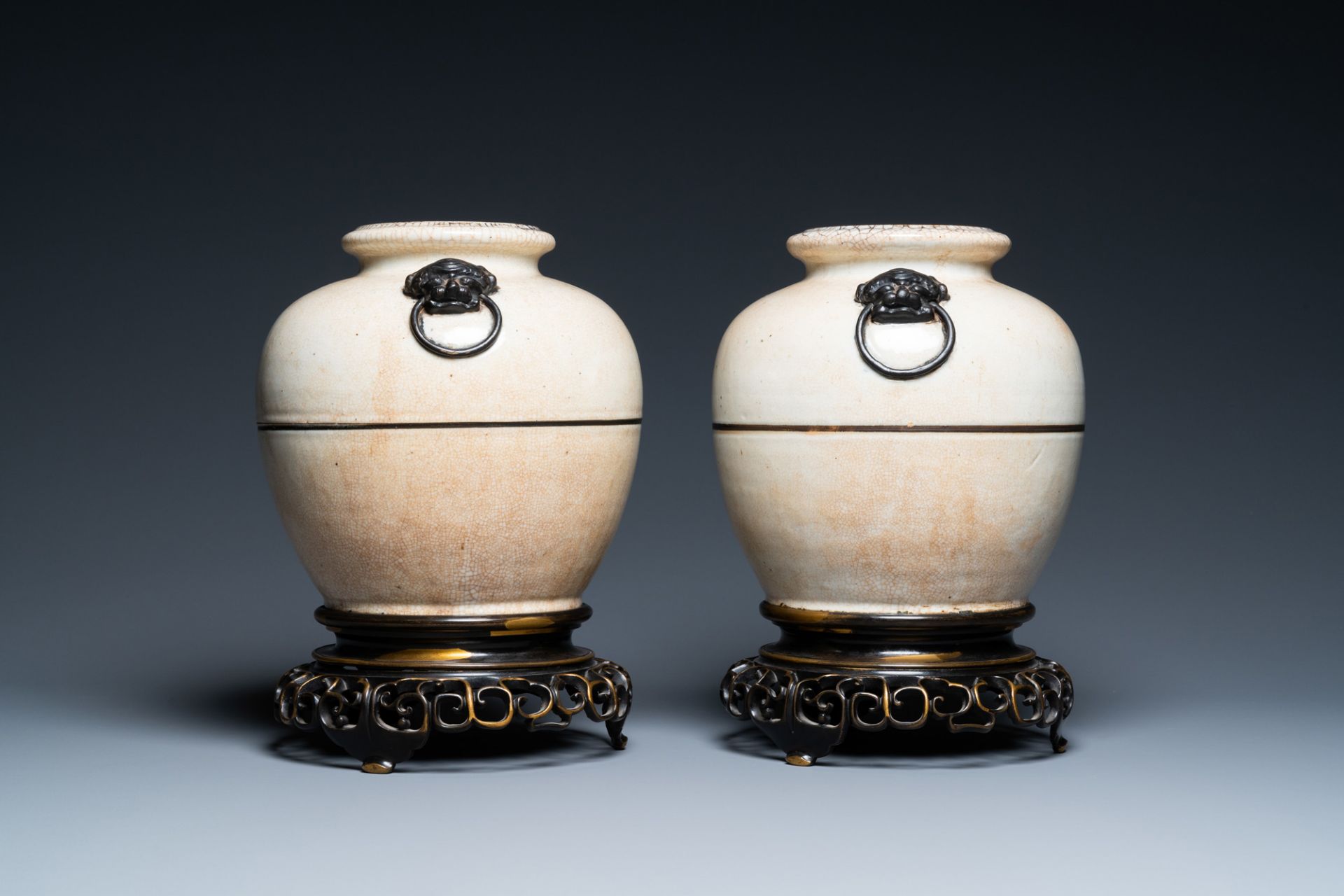 A pair of Chinese monochrome Nanking crackle-glazed vases on reticulated bronze stands, 19th C. - Image 2 of 6