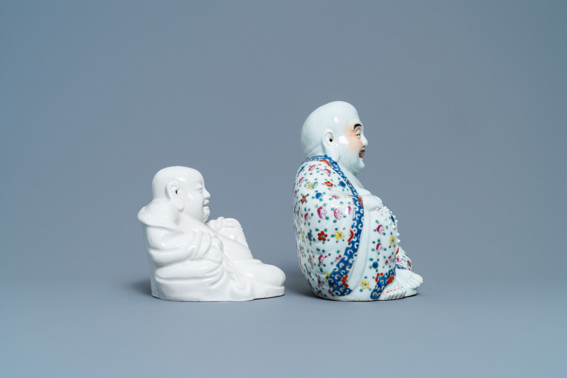 A Chinese famille rose figure of Buddha and one in blanc de Chine, 19/20th C. - Image 3 of 7