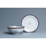 A large Chinese monogrammed export porcelain punchbowl and dish, Qianlong