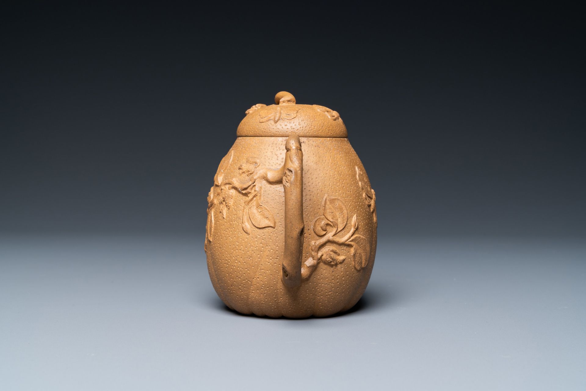 A Chinese Yixing stoneware teapot with squirrels and butterflies, seal mark, 18th C. - Image 6 of 8