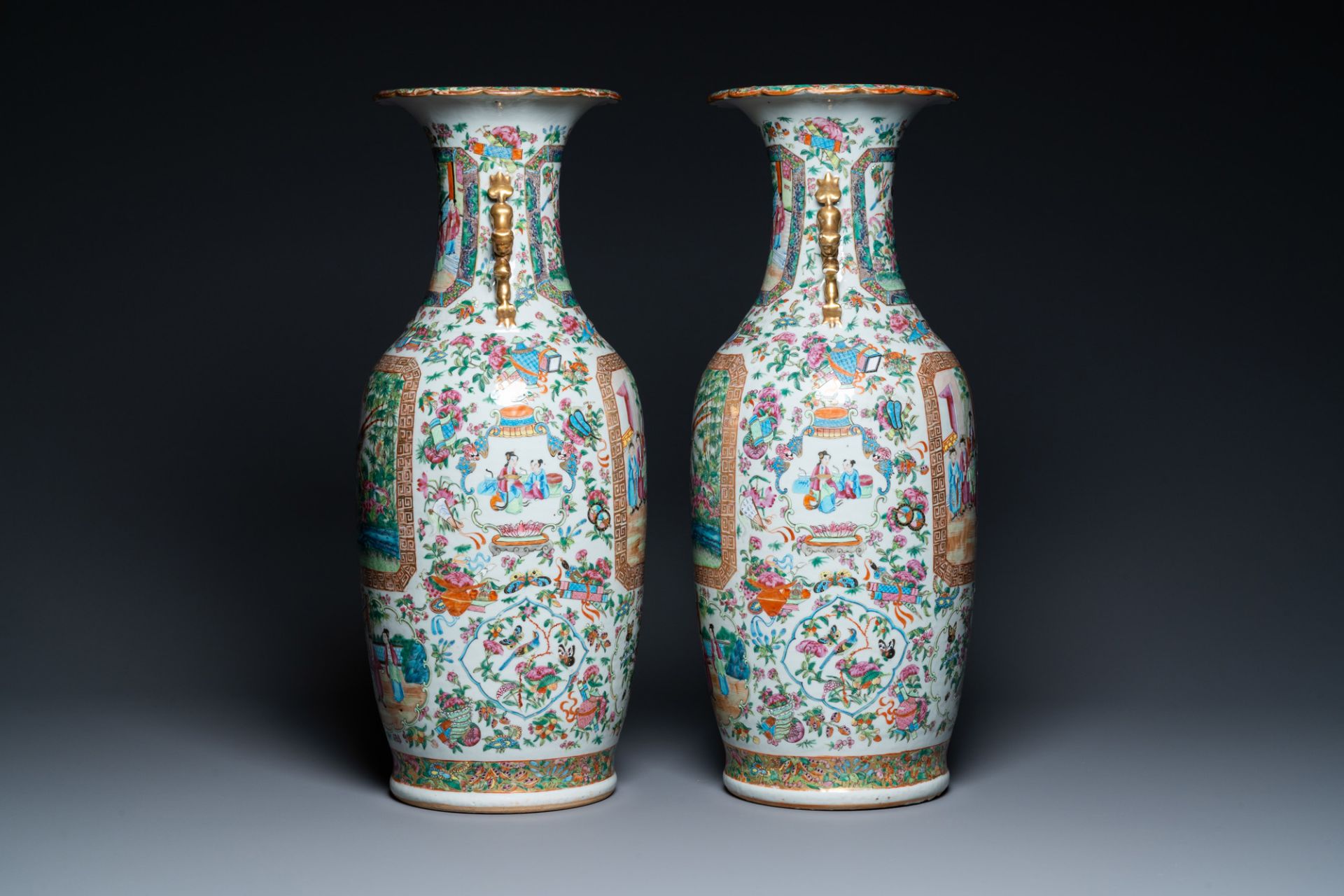 A pair of Chinese Canton famille rose vases, 19th C. - Image 2 of 6