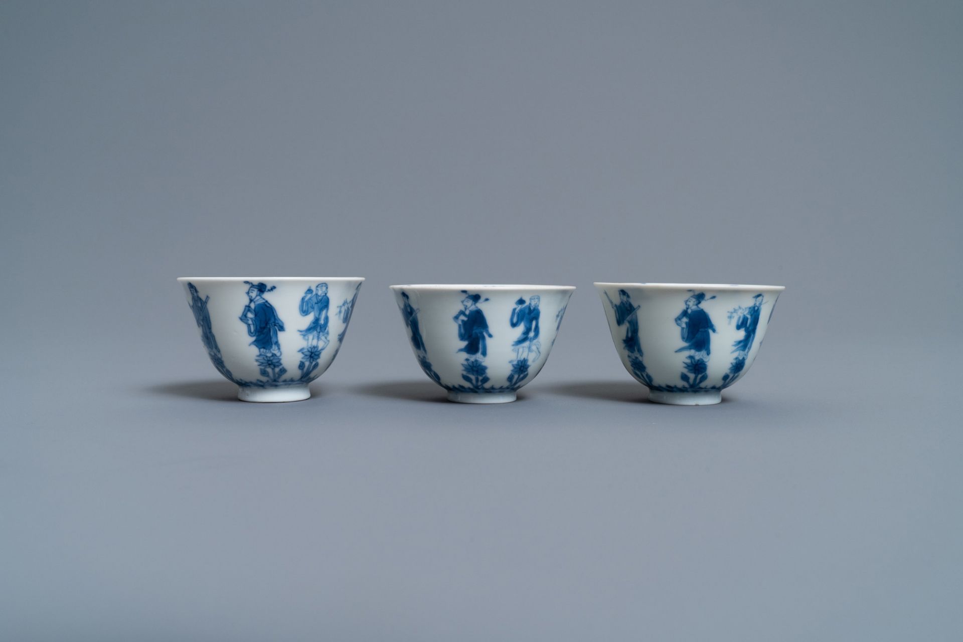 Three Chinese blue and white cups and two saucers, Kangxi - Image 6 of 9