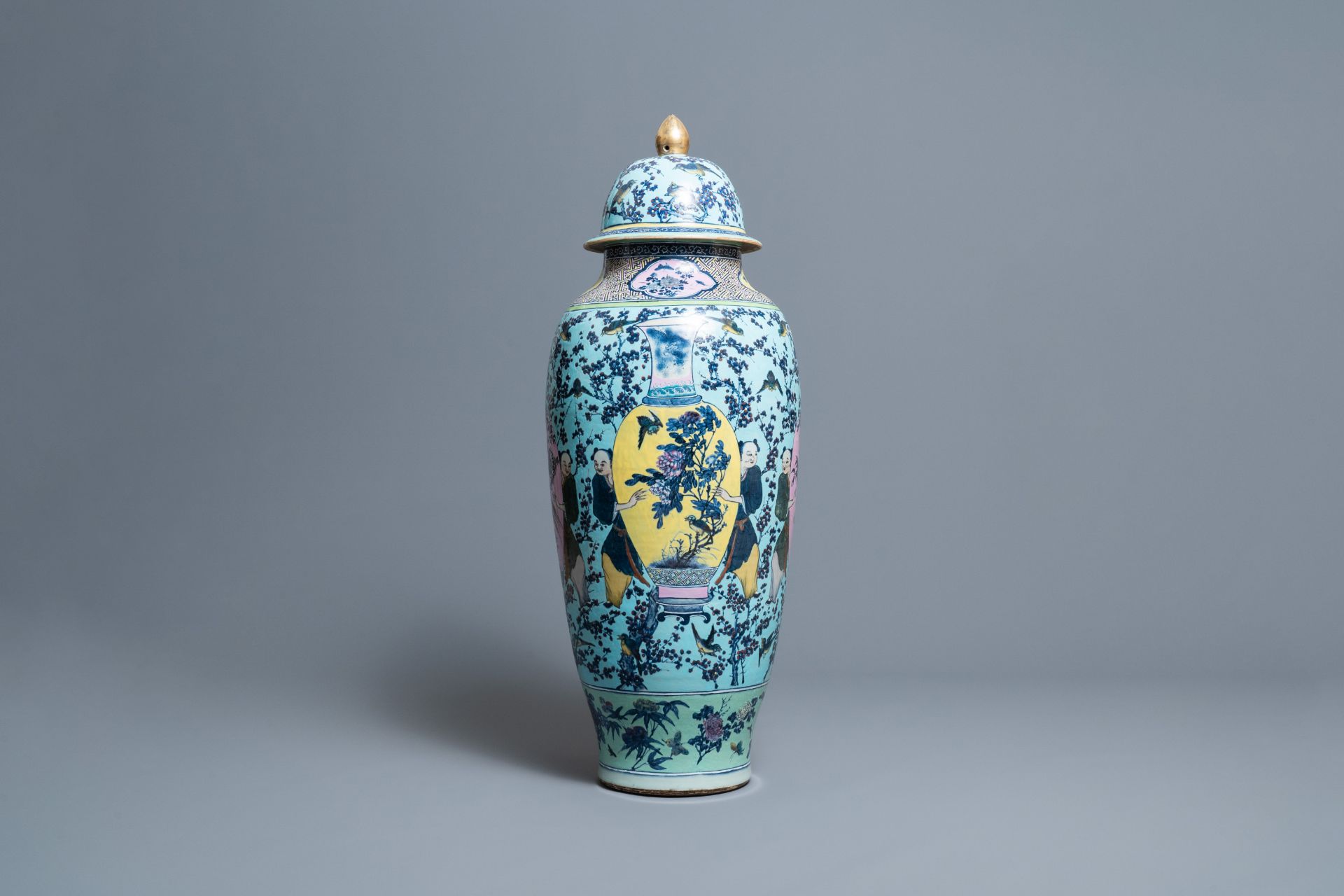 A very large Chinese famille rose turquoise-ground vase and cover, 19th C.