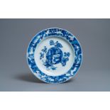A Chinese blue and white dish with raised central medallion, Kangxi