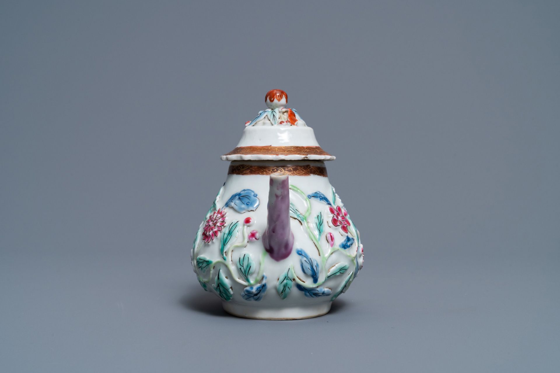 A Chinese famille rose relief-decorated teapot on stand, Yongzheng - Image 8 of 10