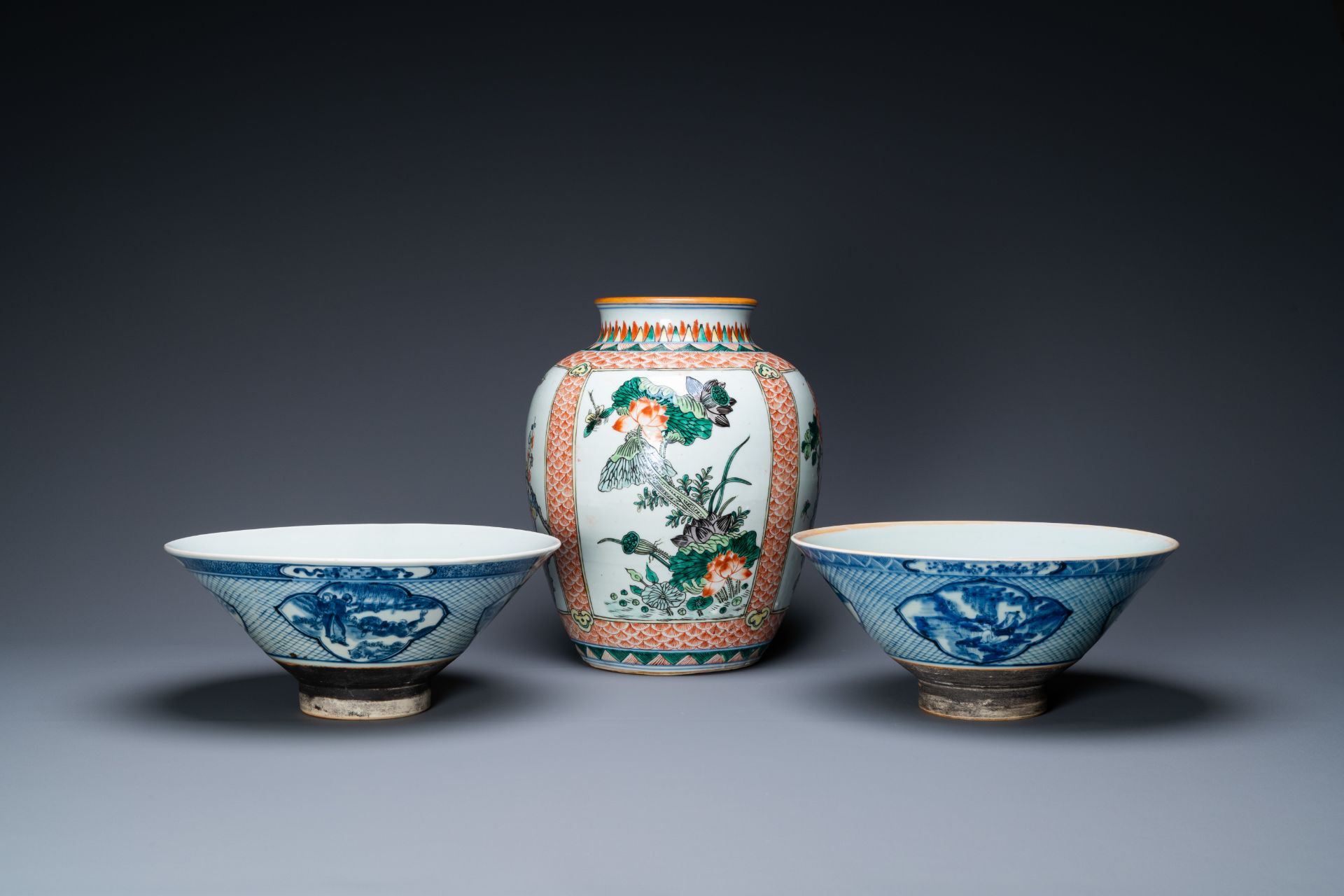 A pair of Chinese blue and white bowls and a famille verte vase, 19th C.