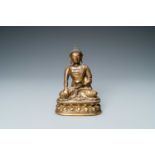 A Chinese gilt bronze 'Medicine Buddha' figure, 17/18th C.