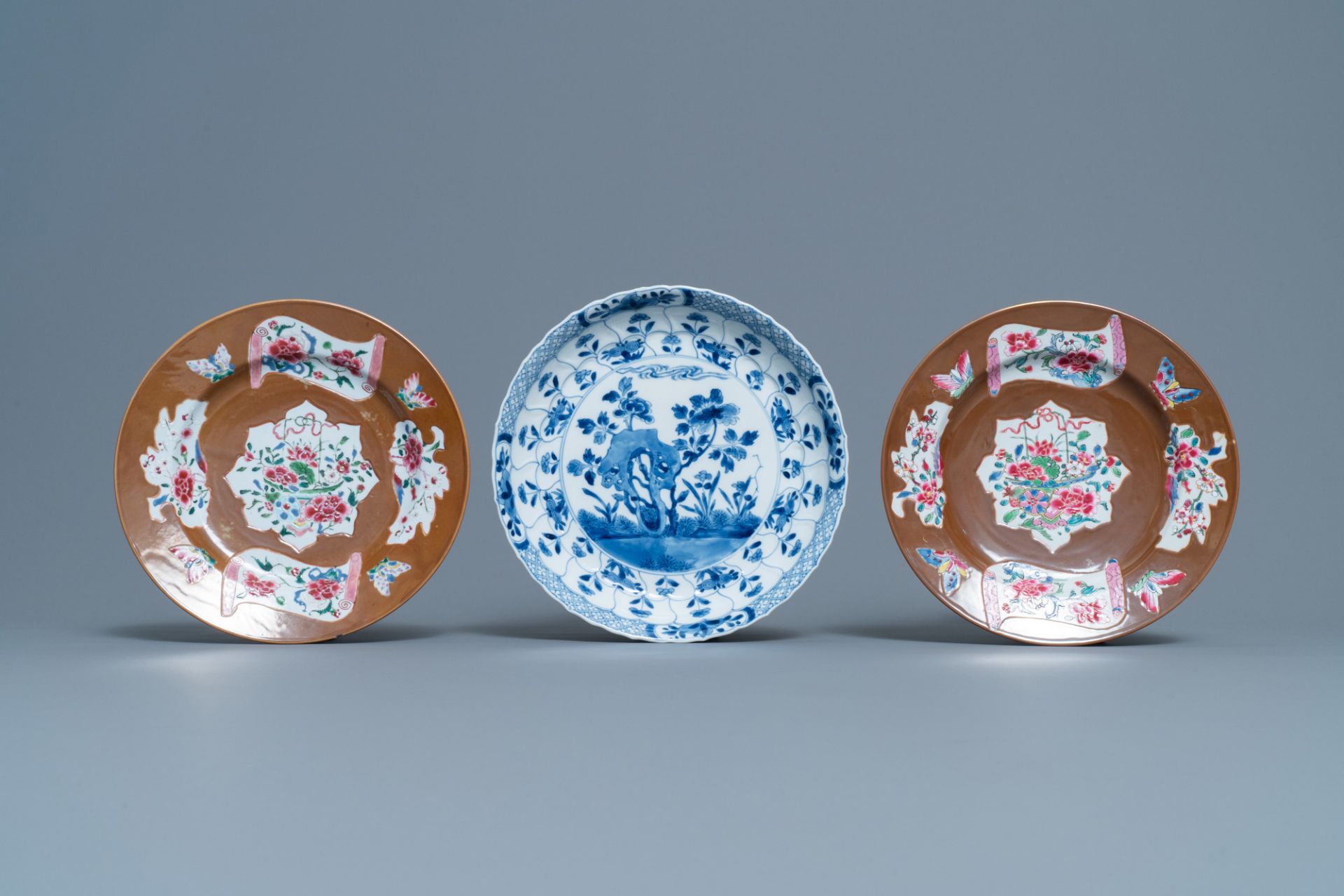 A pair of Chinese famille rose plates, Qianlong, and a blue and white plate, Kangxi mark and of the - Image 2 of 3