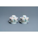 A pair of Chinese qianjiang cai covered bowls on stands, 19/20th C.