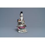 A Chinese famille rose figure of a lady on a lotus throne, 19th C.