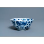 A Chinese blue and white lotus-molded bowl with floral design, Kangxi mark and of the period