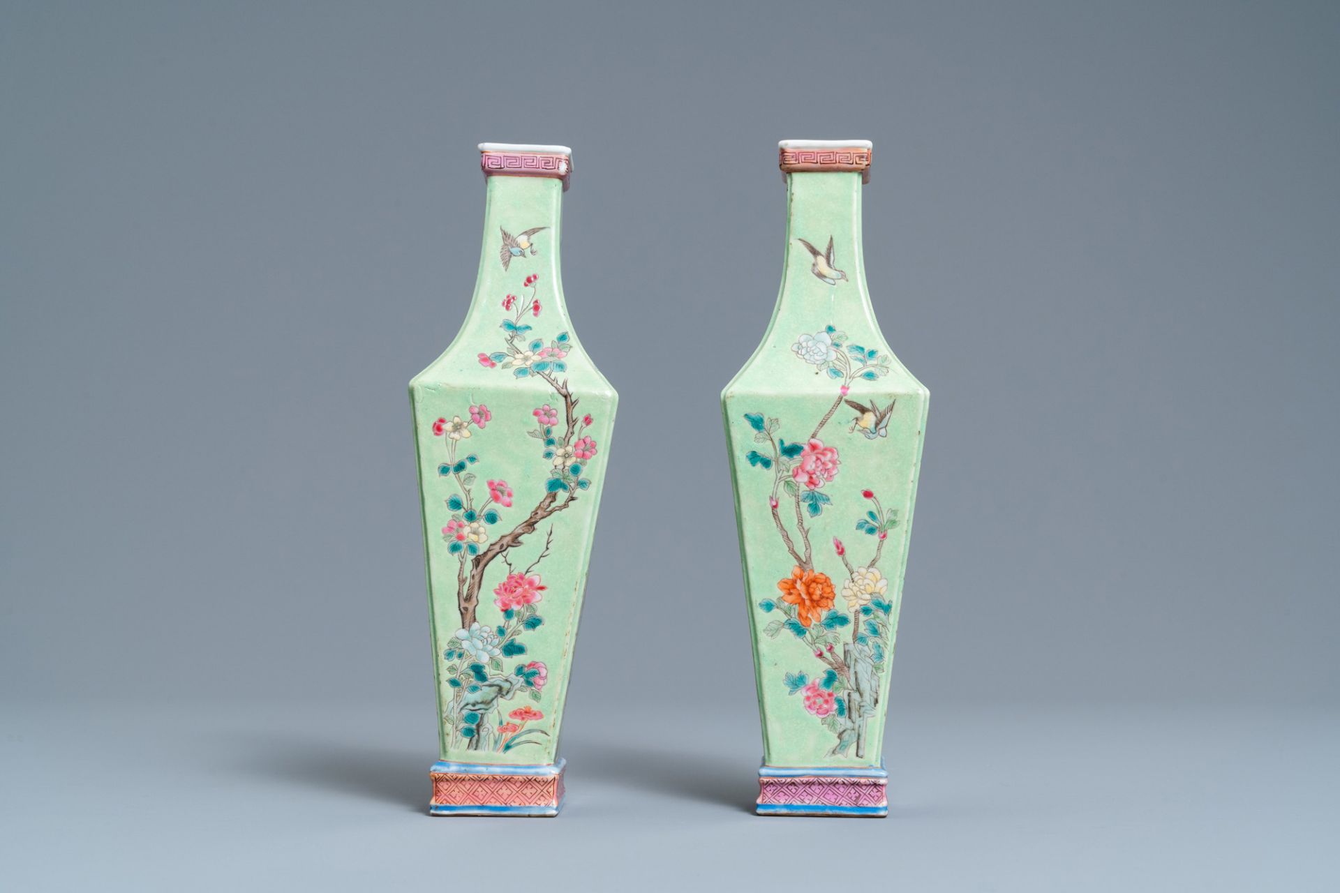 A pair of Chinese famille rose green-ground vases with floral design, 19th C. - Image 4 of 6