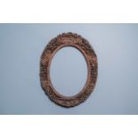 A large Chinese oval reticulated wooden frame, Canton, 19th C.