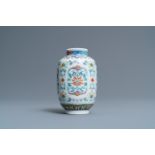 A Chinese miniature doucai vase, Yongzheng mark and of the period