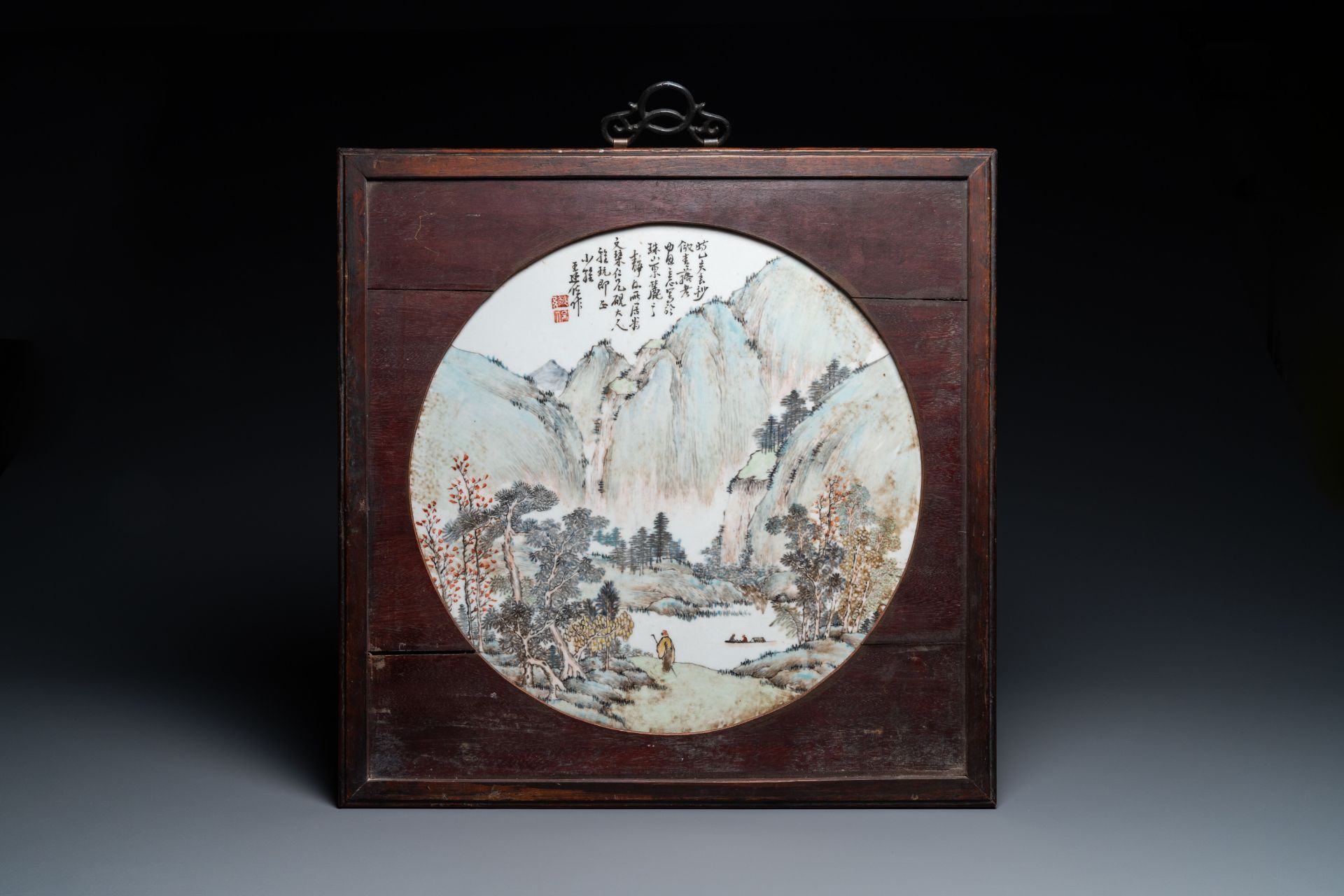 A round Chinese qianjiang cai 'landscape' plaque, signed Wang Shao Wei, 19th C.