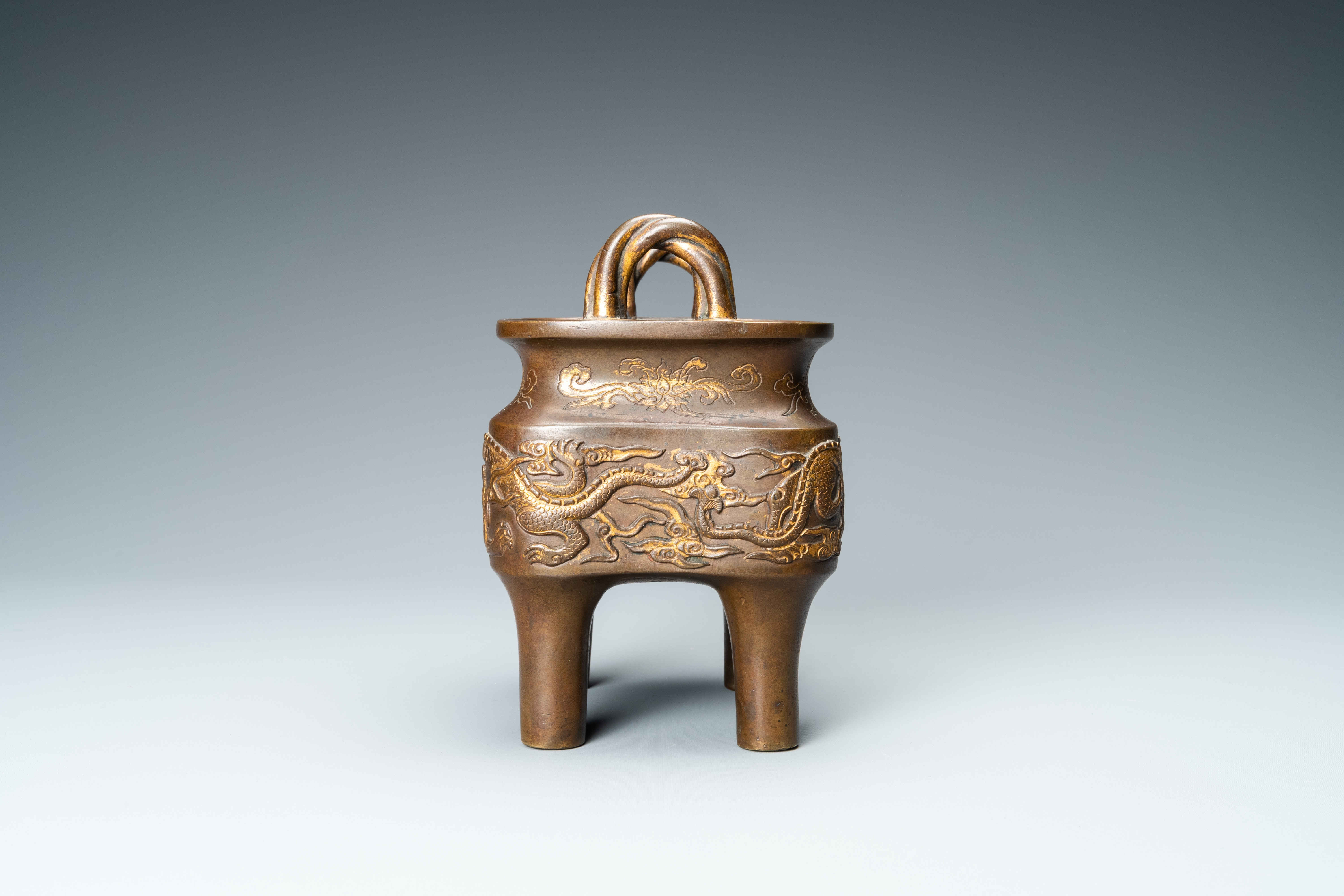 A Chinese partly gilded bronze censer with jade-topped wooden cover, Xuande mark, Kangxi - Image 5 of 17