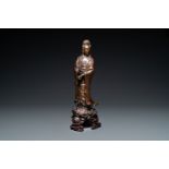 An exceptionally large Chinese silver-inlaid bronze figure of Guanyin, Yutang Shi Sou mark, Qing