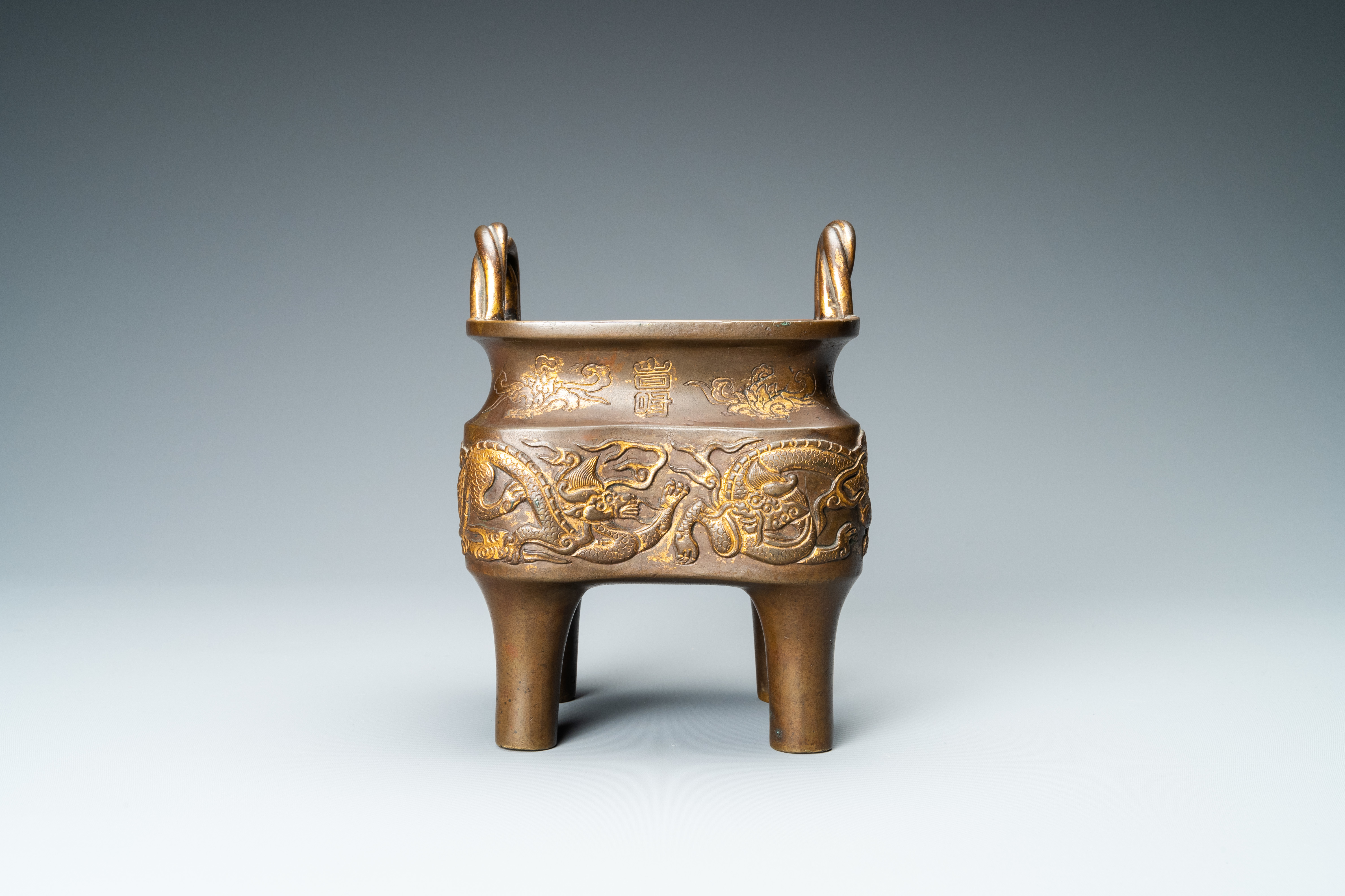 A Chinese partly gilded bronze censer with jade-topped wooden cover, Xuande mark, Kangxi - Image 6 of 17