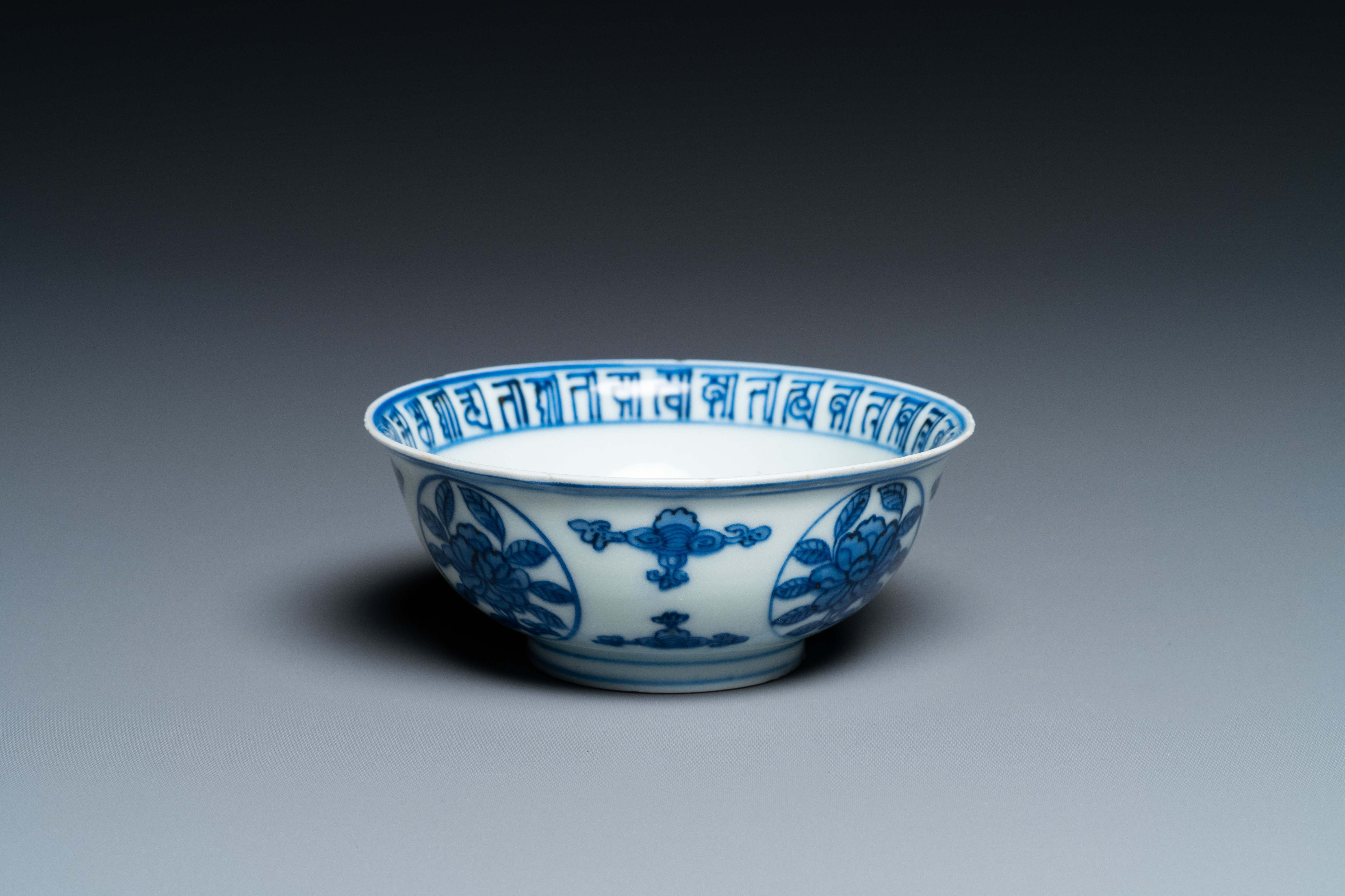 A Chinese blue and white 'dragon' bowl with lanca-characters, Wanli mark and of the period - Image 3 of 9