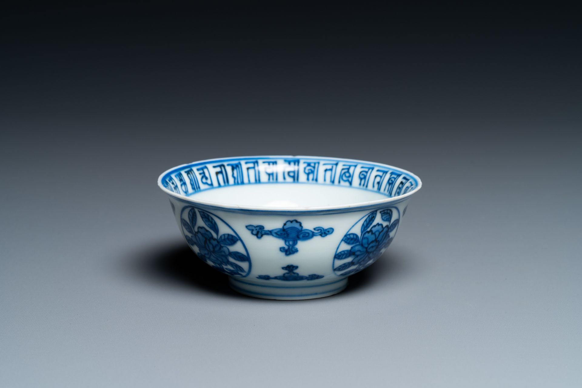 A Chinese blue and white 'dragon' bowl with lanca-characters, Wanli mark and of the period - Image 3 of 9