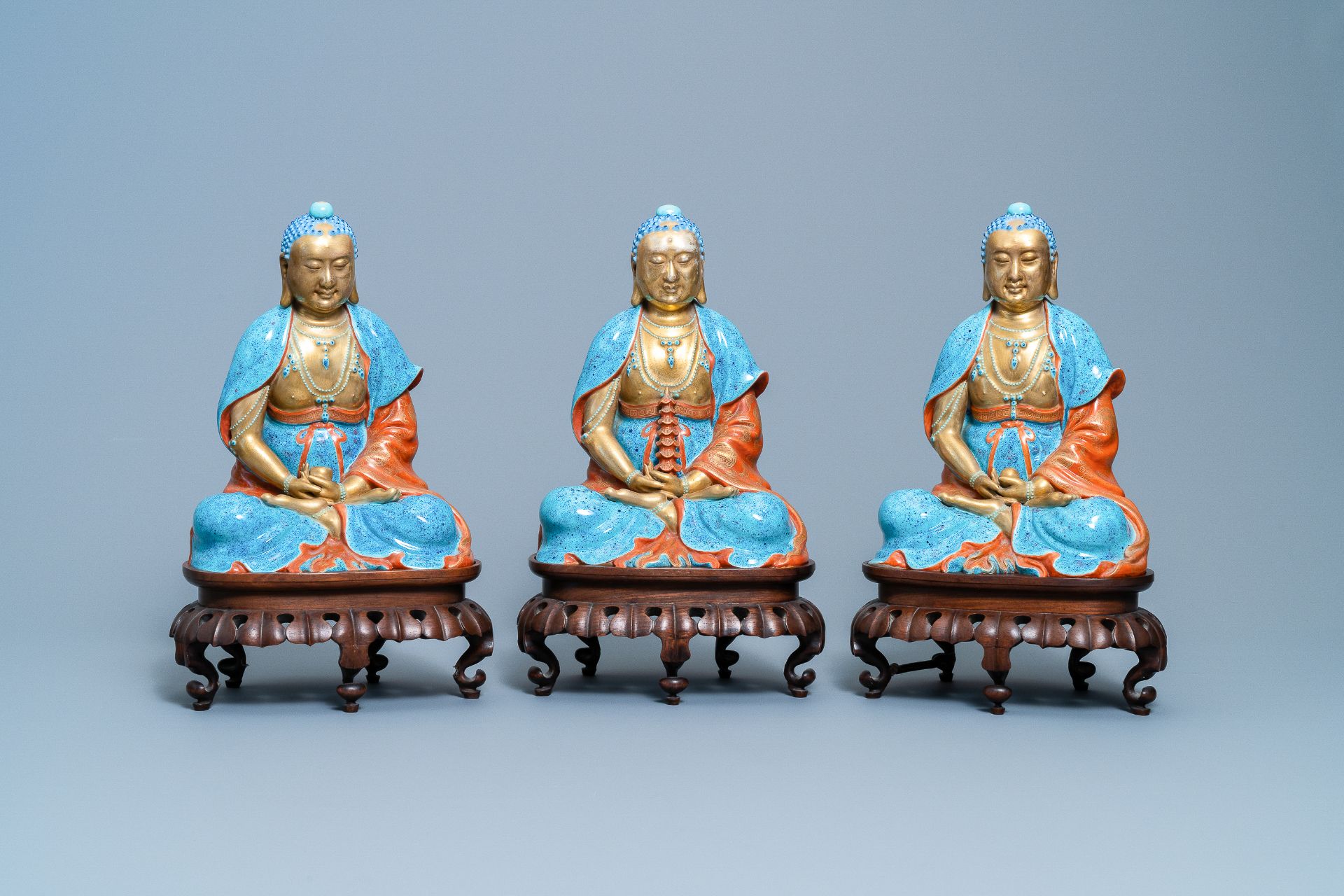 Three Chinese robin's egg and gilt figures of Bodhisattva, Qianlong/Jiaqing