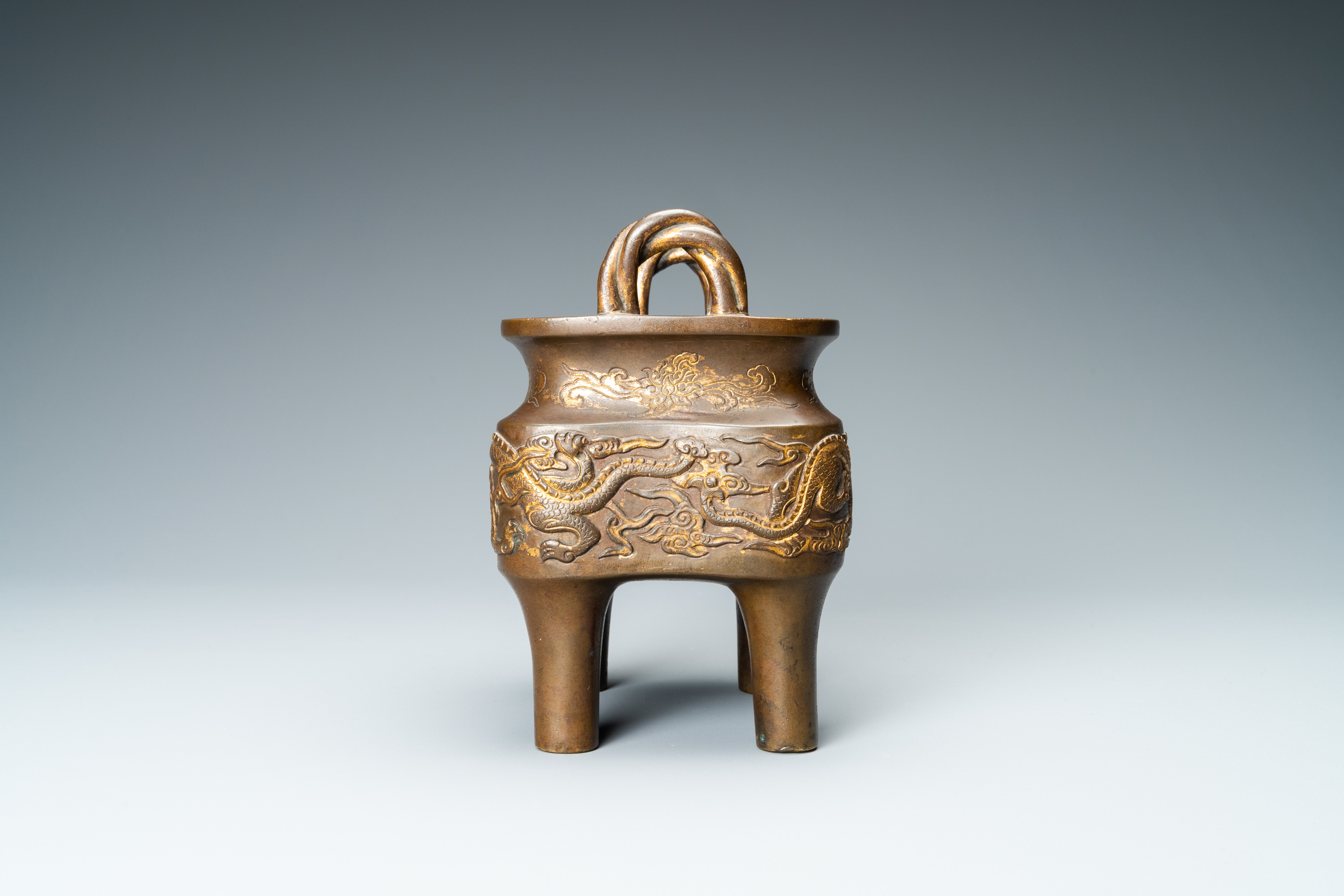 A Chinese partly gilded bronze censer with jade-topped wooden cover, Xuande mark, Kangxi - Image 7 of 17