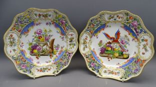 FINE PAIR OF COLOURFUL MEISSEN DISPLAY PLATES, the pattern being a variation on the bird and spaniel